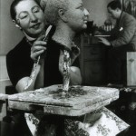 Dora sculpting a head